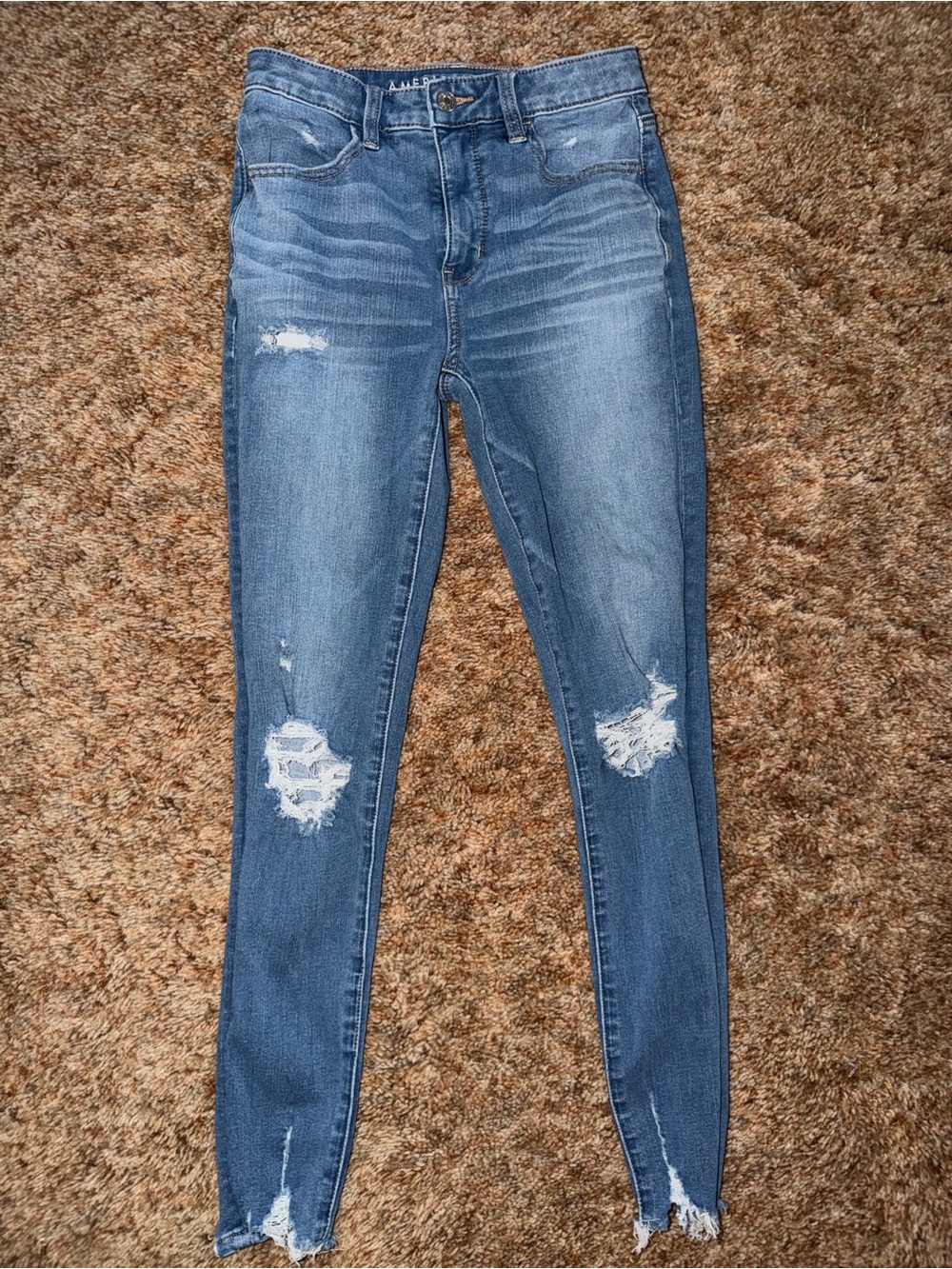 American Eagle Outfitters Blue Distressed super High-Rise jeggings